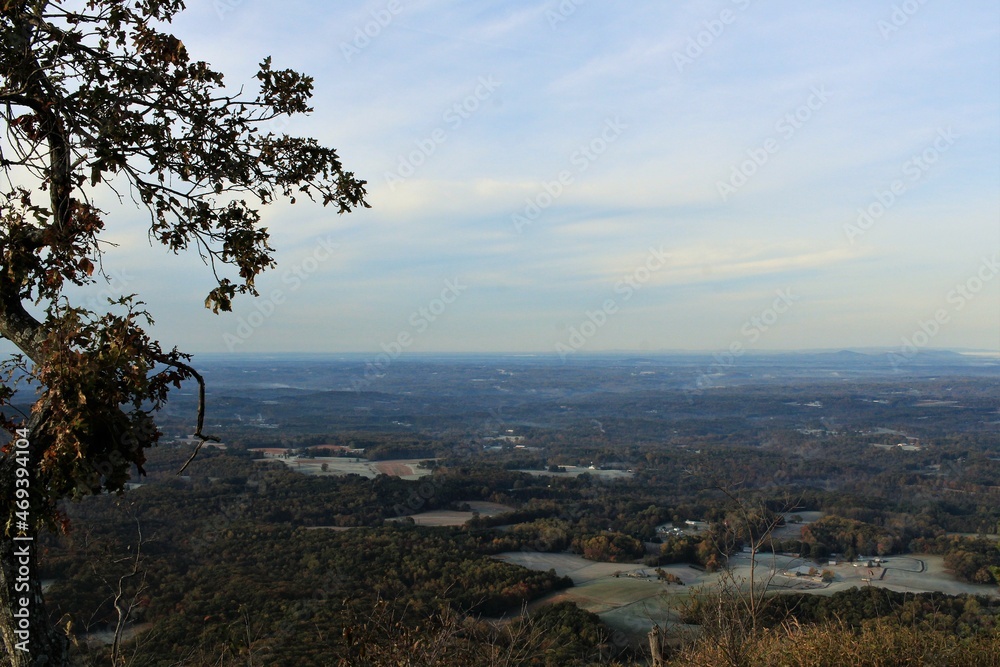 scenic view from mountain top overlooking valley below