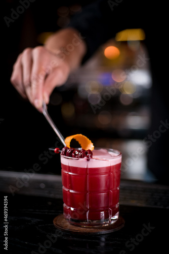 bartender pounding cocktail