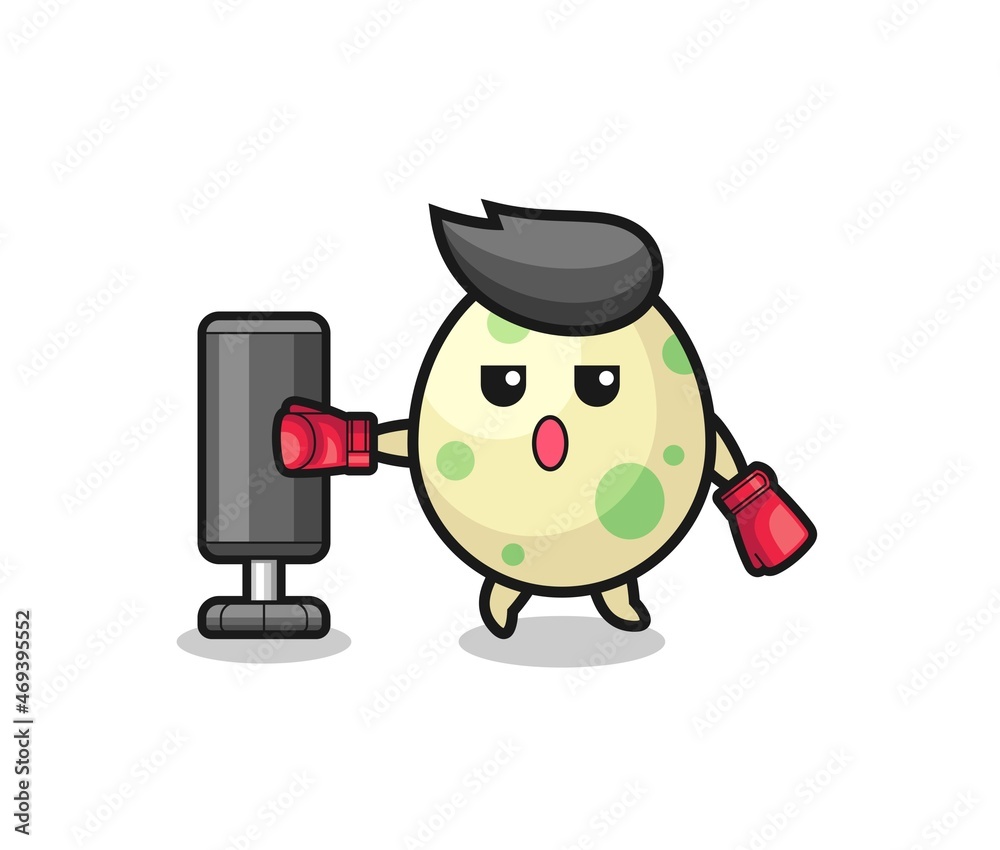 Fototapeta premium spotted egg boxer cartoon doing training with punching bag