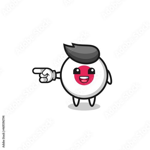 japan flag cartoon with pointing left gesture
