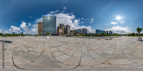 Fototapeta Naklejka Na Ścianę i Meble -  360 seamless hdri panorama view on square near seashore or ocean with skyscrapers with blue sky and good weather in equirectangular spherical projection, ready AR VR virtual reality content