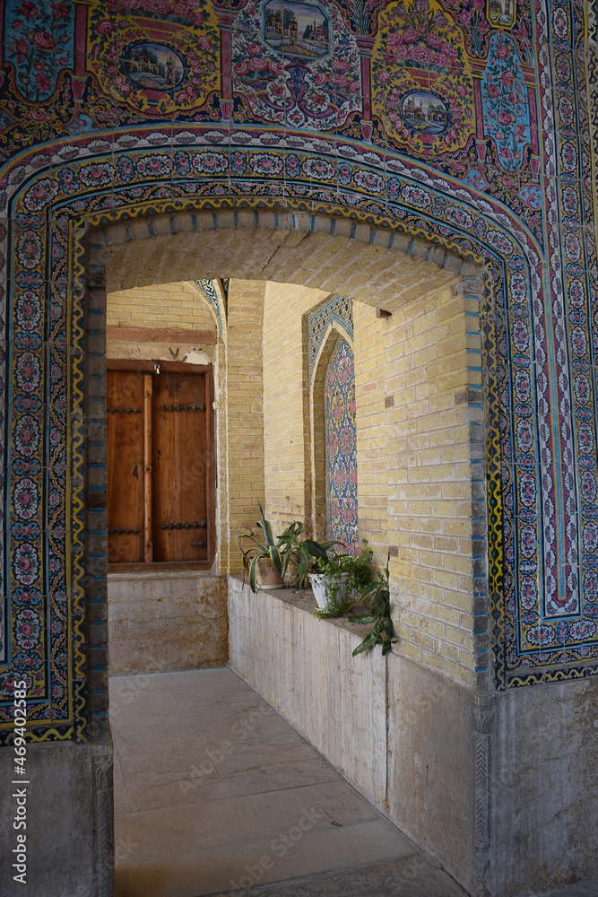 traditional tiled arch and window in Shiraz, Iran
