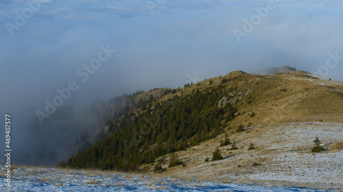 Mountain crest in a sea of clouds