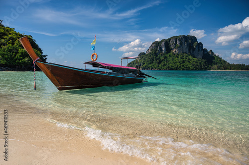Tropical islands view with long tail boat ocean blue sea water and white sand beach, Krabi Thailand nature landscape