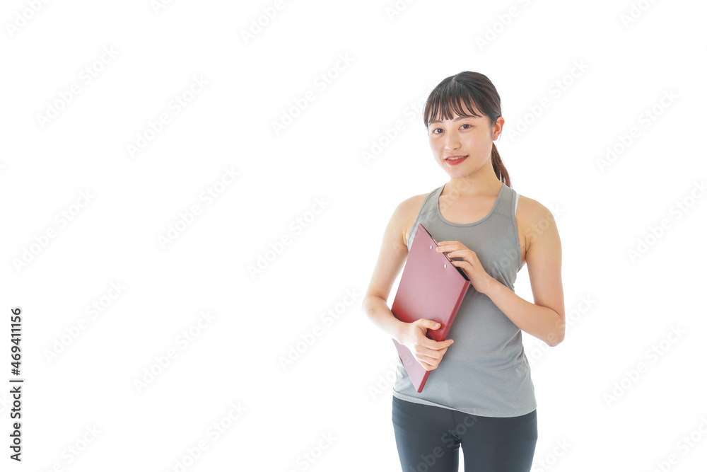 スポーツウェアを着た若い女性 スポーツウェアを着た若い女性