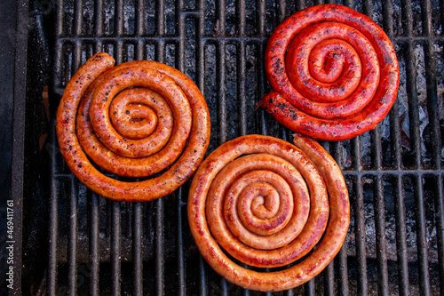 Tres longanizas en el asador  photo