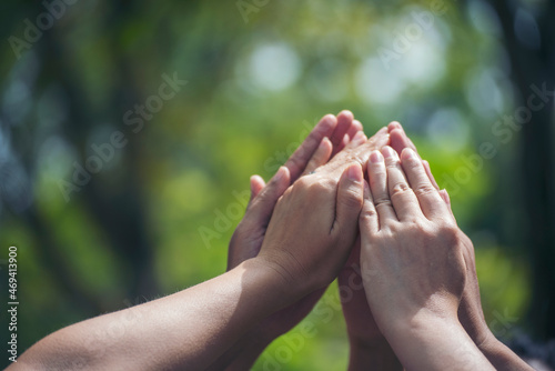Group of teamwork high five team together hands raise up power partner. Diversity multiethnic group of business people success team together. Collaborate Volunteer friendship mission Business partner