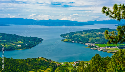 The beauty of Lake Toba which is a caldera lake comes from an ancient volcanic eruption and is the largest volcanic lake in the world. View from geosite hutaginjang. North Sumatra, Indonesia © YURIANTO