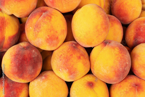 juicy ripe peaches close up background