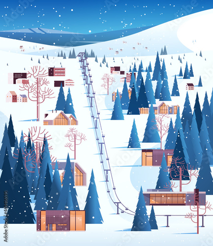 cableway in snowy mountains residential houses area ski resort christmas new year holidays celebration winter vacation