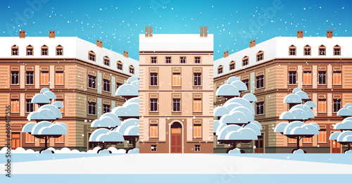 night winter city street with modern houses exterior urban buildings facade horizontal cityscape background