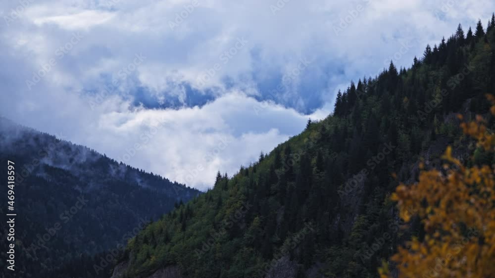Beautiful landscape view of clouds above mountains in autumn. Beautiful landscape view of clouds above mountains in autumn.