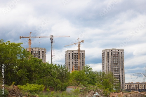 The architectural complex of residential buildings on sky background