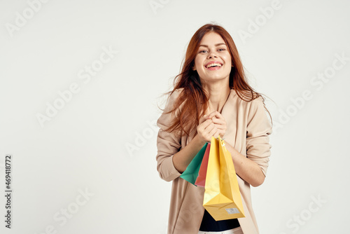 pretty woman multicolored packs emotions shopping light background