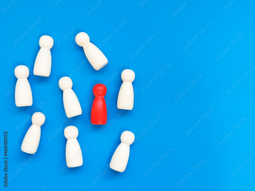 Infected,sick people or stranger in the crowd. Wooden dolls against blue background. Infected,sick people or stranger in the crowd. Wooden dolls against blue background.