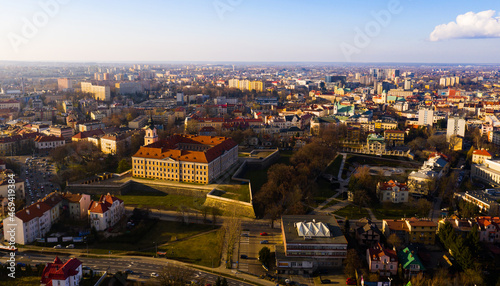 Aerial view of Renaissance building of Rzeszow castle on background of modern cityscape in springtime  Poland