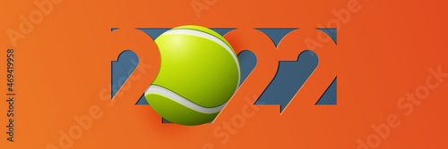Happy New Year 2022 banner with numbers 2022 and decoration with tennis ball and tennis court. Banner template design for New Year decoration in paper cut style. 