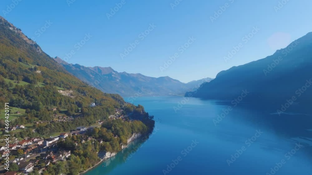 Aerial drone view of beautiful lake and alps mountains in Brienz Switzerland, Europe. Wide Angle. Aerial drone view of beautiful lake and alps mountains in Brienz Switzerland, Europe. Wide Angle.