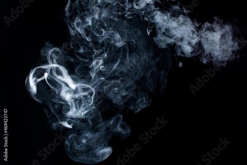 dense white smoke on a black background © BillionPhotos.com