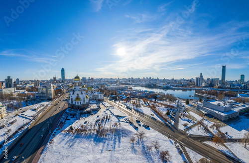 Yekaterinburg aerial panoramic view at Winter in sunny day. Panorama of winter Yekaterinburg and Temple on Blood in sunny day.