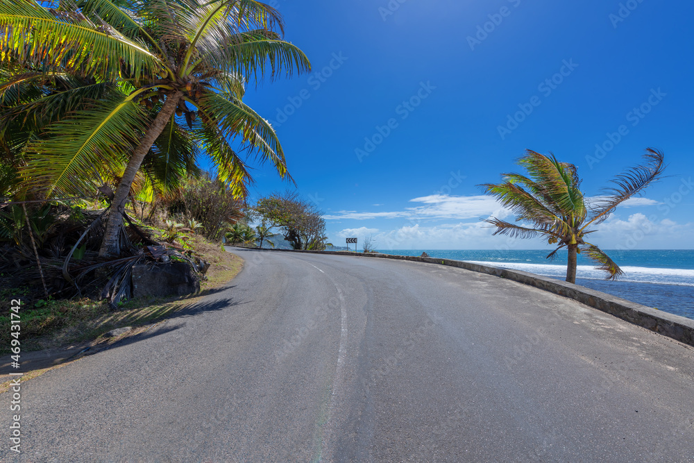 Scenic beach road in tropical island, Mahe, Seychelles. Scenic beach road in tropical island, Mahe, Seychelles.