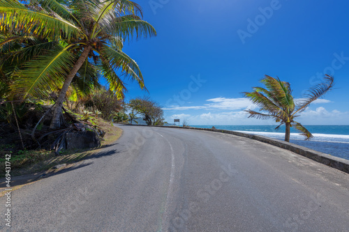 Scenic beach road in tropical island, Mahe, Seychelles.