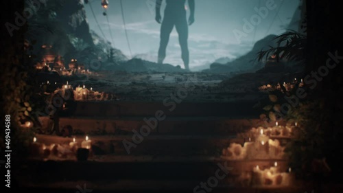 CGI scene of a mysterious alien warrior standing in a beautiful ancient temple with candles and old golden urns and giant face statue. photo