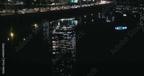 Philadelphia's FMC building at night, reflected in the Schuykill River photo