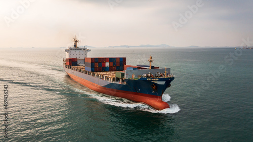 Container ship in import export global business worldwide logistic and transportation, Container ship unloading freight shipment, Aerial view container cargo boat freight ship.