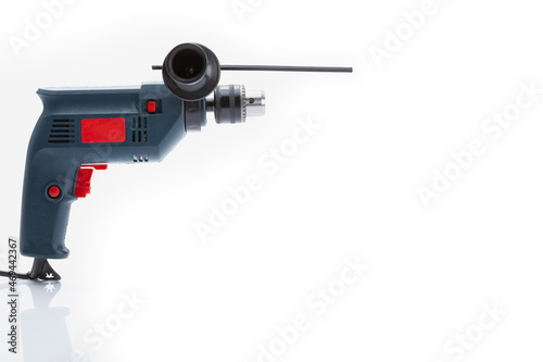 Professional tool electric drill isolated on white background. Electric hand tools.