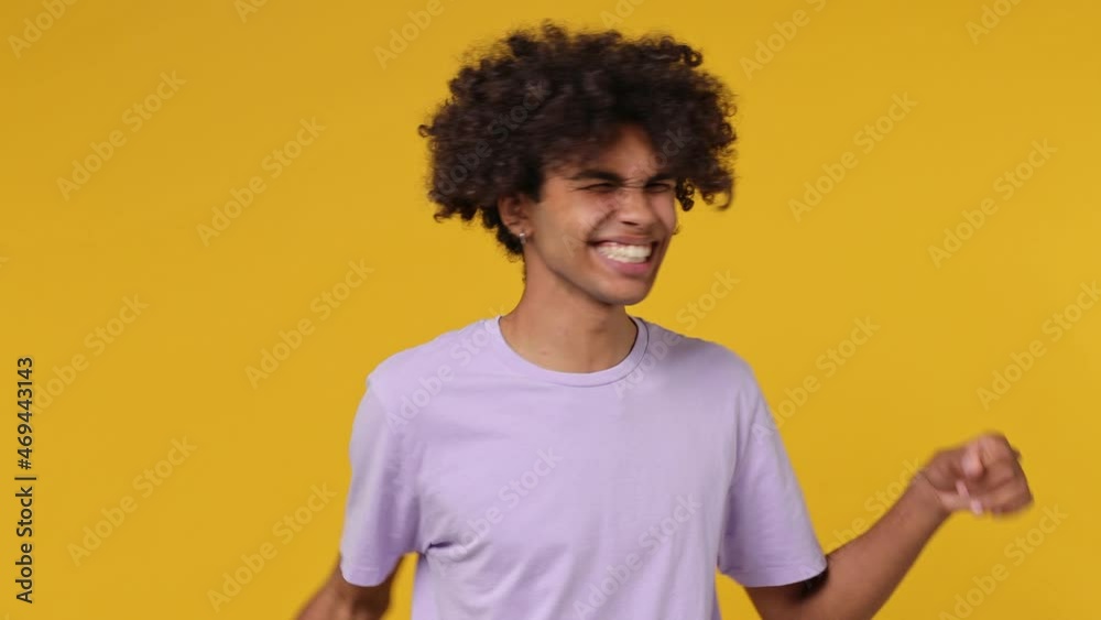 Young curly african american man 20s wears white t-shirt countdown 1 2 3 one two three go celebrate win scream rejoices doing winner hands gesture isolated on plain yellow background studio portrait Young curly african american man 20s wears white t-shirt countdown 1 2 3 one two three go celebrate win scream rejoices doing winner hands gesture isolated on plain yellow background studio portrait