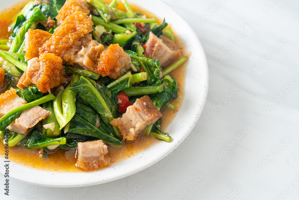 Stir-fried kale vegetable with crispy pork