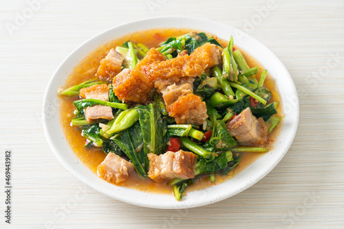 Stir-fried kale vegetable with crispy pork