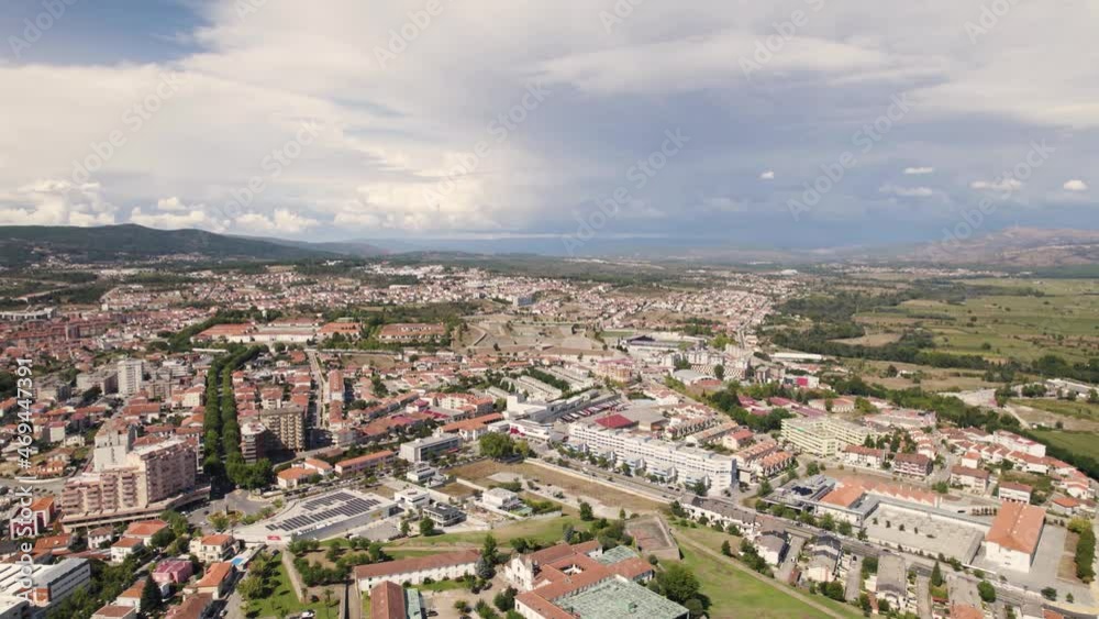 Aerial High view over City of Chaves Sprawling in distance, Cloudy day - Portugal Aerial High view over City of Chaves Sprawling in distance, Cloudy day - Portugal