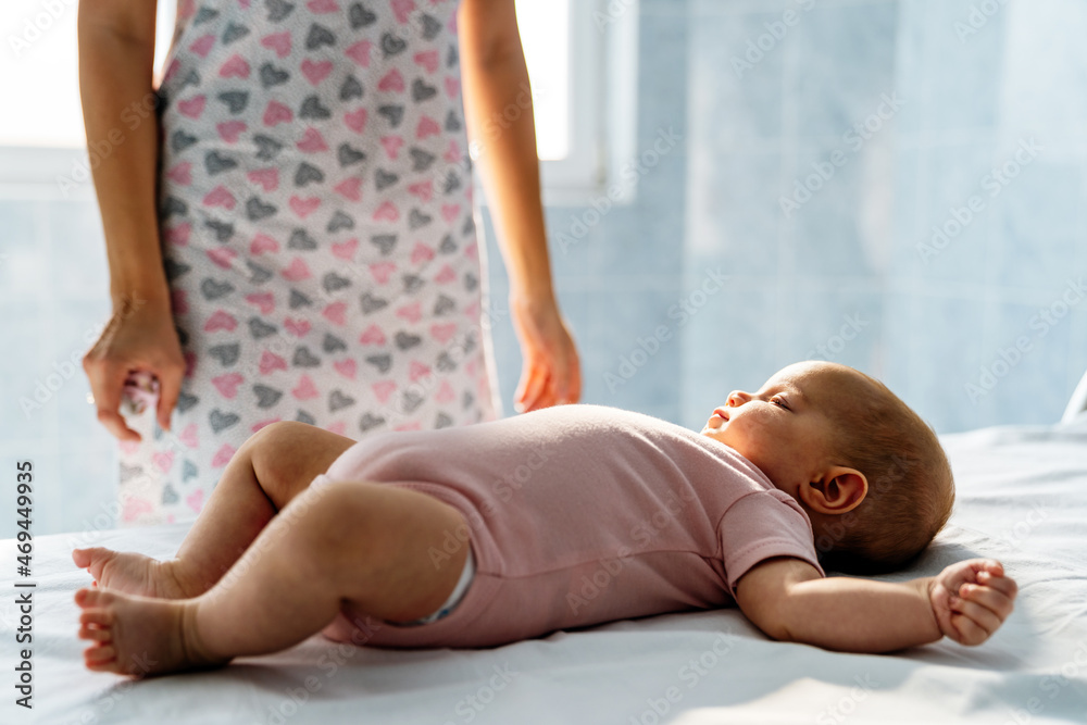 Mother with baby keeps a distance because of postpartum depression. Mental disorder, tiredness Mother with baby keeps a distance because of postpartum depression. Mental disorder, tiredness