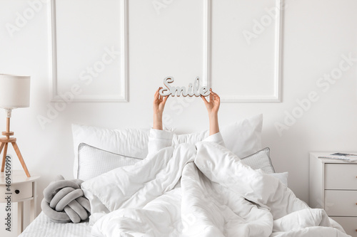 Morning of young woman lyin...