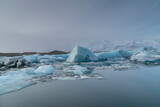 Icebergs in the ice field on a lagoon, arctic landscape, in Iceland