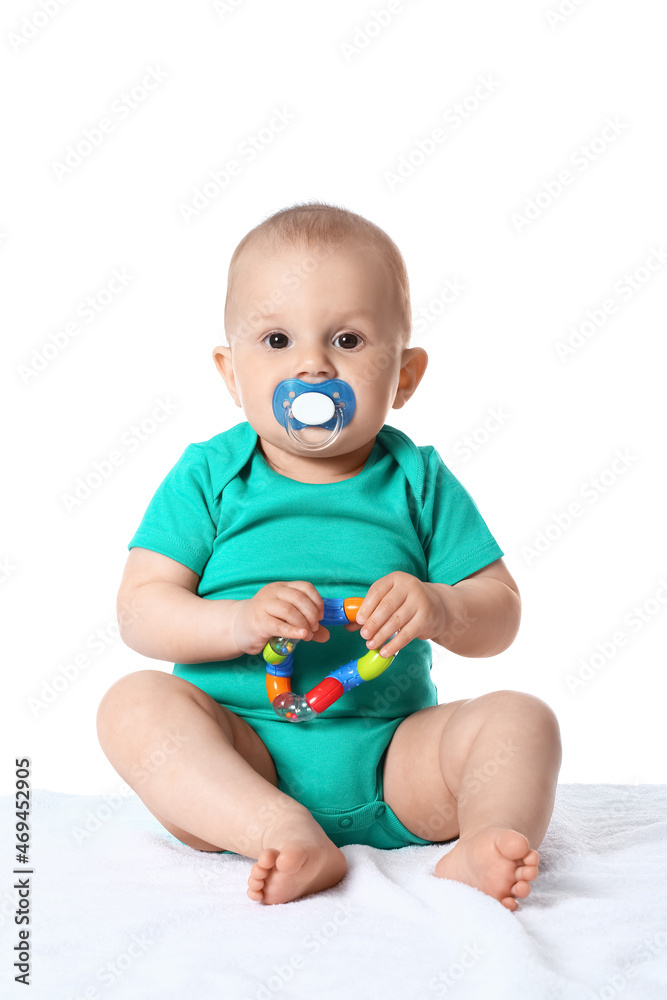 Cute little baby boy with nibbler and toy on white background Cute little baby boy with nibbler and toy on white background