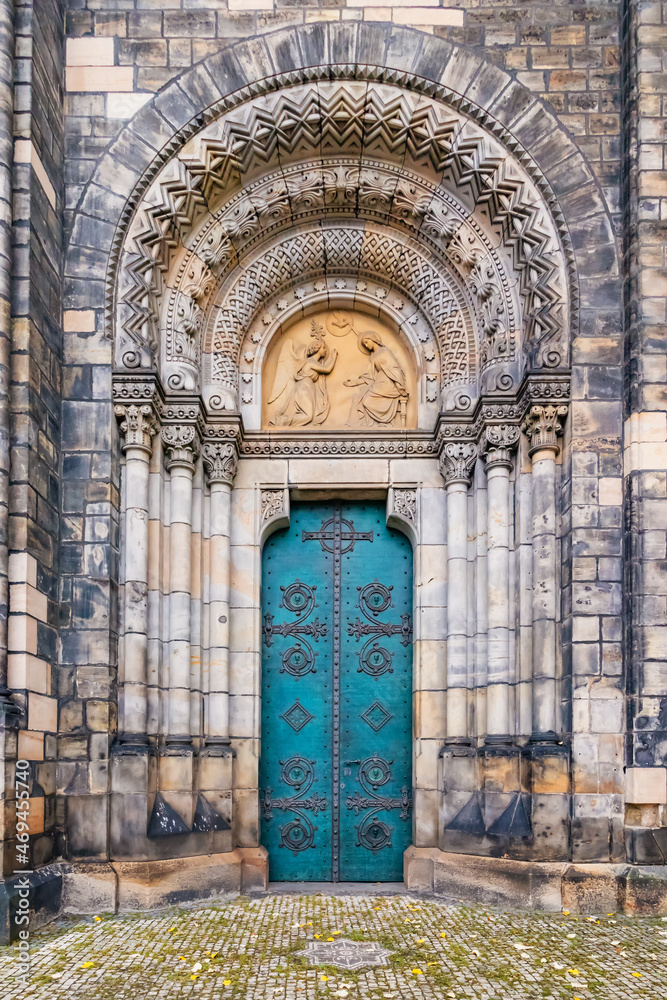 Old massive church door of the catholic church