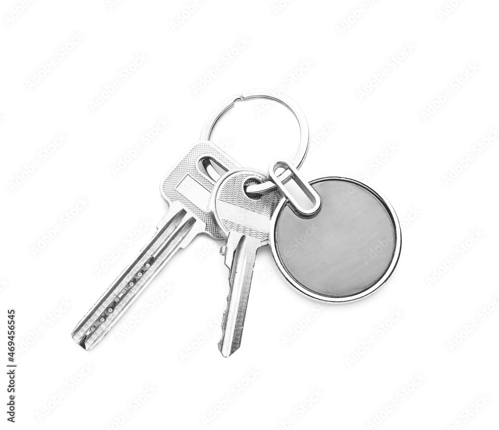Stylish round keychain with keys on white background Stylish round keychain with keys on white background