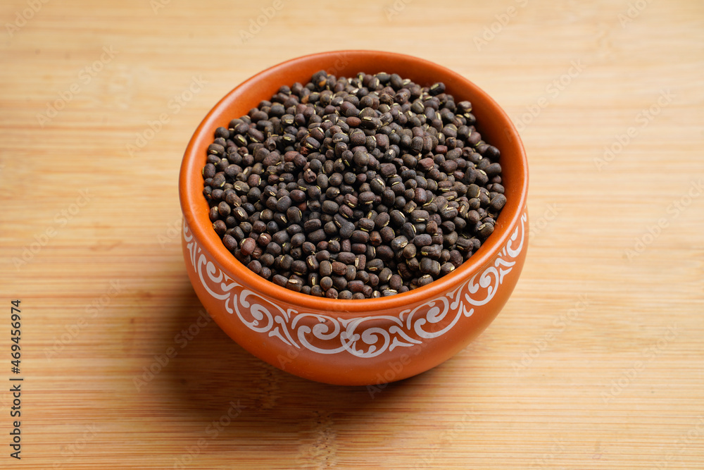 Fresh Black gram or udad in clay bowl Fresh Black gram or udad in clay bowl