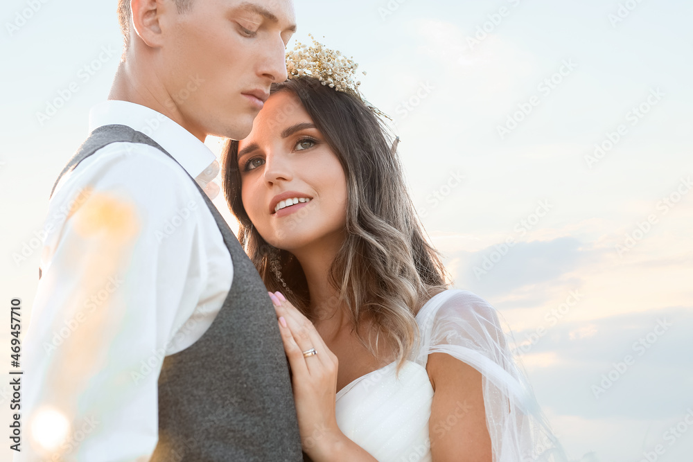 Happy wedding couple on summer day