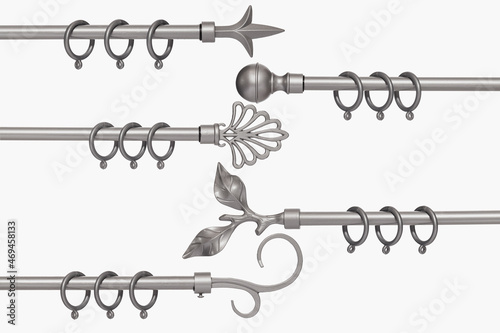 Foto Set of metallic silver curtain rods isolated on a white background