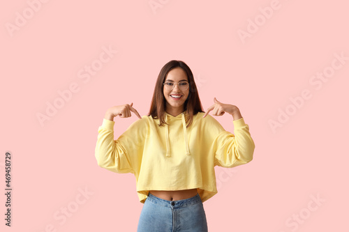 Beautiful young woman in st...