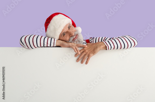 Santa Claus with blank post...