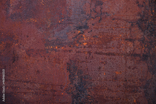 Abstract dirty grunge rusted metal background with rust and oxidized texture. Weathered and cracked surface of iron damaged wall.