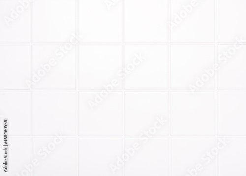 Classic marble white square tile wall texture background in room at subway. Abstract weathered bricks design, horizontal architecture wallpaper.