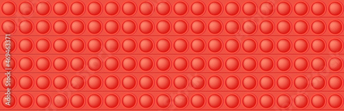 Popit red seamless pattern as a fashionable silicon fidget toy. Addictive anti-stress toy in bright color. Bubble popits for kids fingers. Vector illustration in rectangle format suitable for bunner.