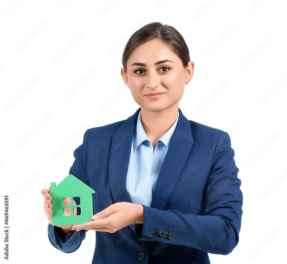 Female real estate agent with figure of house on white background Female real estate agent with figure of house on white background