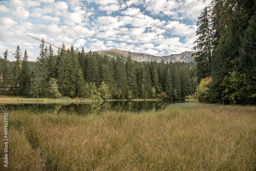 autumn Nizke Tatry mountains scenery with Vrbicke pleso lake and peaks above in Slovakia photo